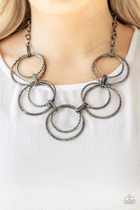 Radiant Revolution - Black Necklace - Paparazzi Accessories