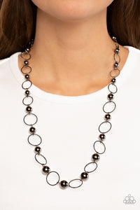 Metro Milestone - Black Necklace - Paparazzi Accessories