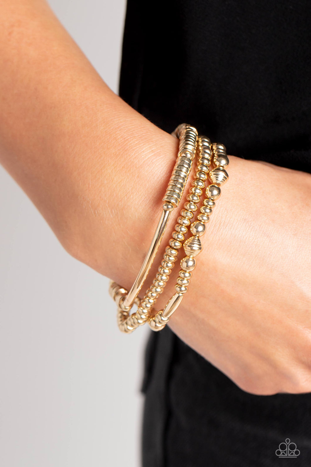 Monochromatic Medley - Gold Bracelet - Paparazzi Accessories